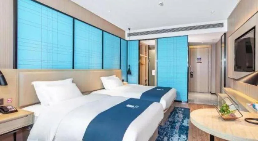 Bed in Echarm Hotel Nanning Dongge Macun Metro Station