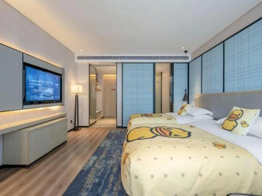 Bed in Echarm Hotel Nanning Dongge Macun Metro Station