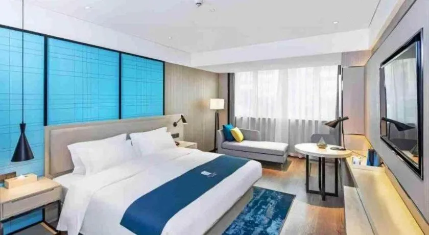 Bed in Echarm Hotel Nanning Dongge Macun Metro Station