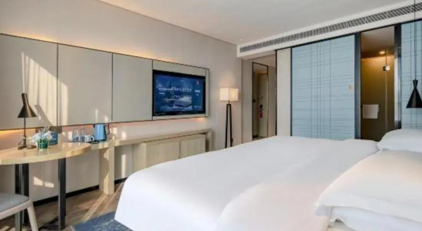 Bed in Echarm Hotel Nanning Dongge Macun Metro Station