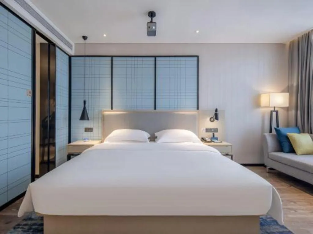 Bed in Echarm Hotel Nanning Dongge Macun Metro Station