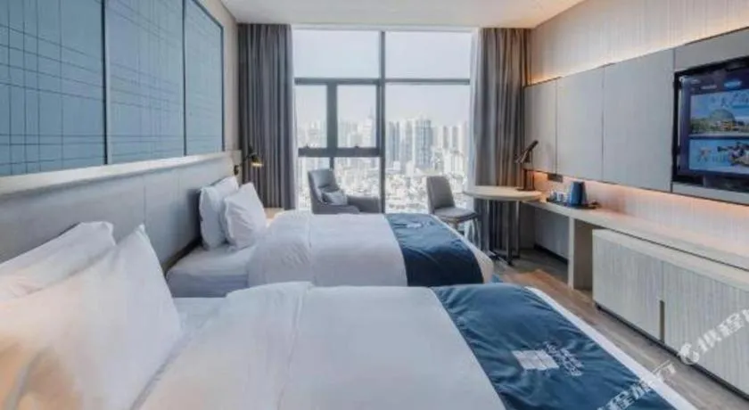 Bed in Echarm Hotel Nanning Dongge Macun Metro Station