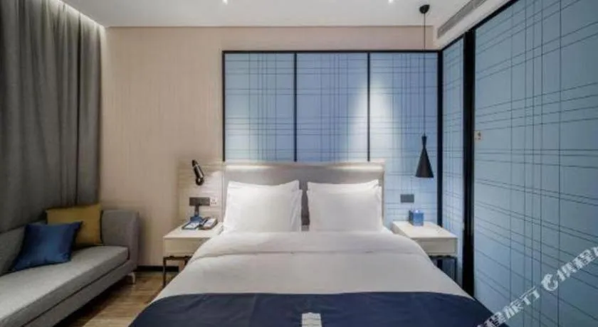 Bed in Echarm Hotel Nanning Dongge Macun Metro Station