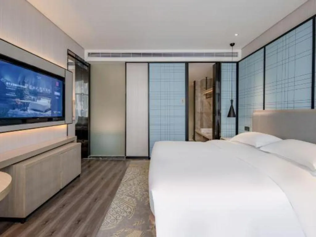 Bed in Echarm Hotel Nanning Dongge Macun Metro Station