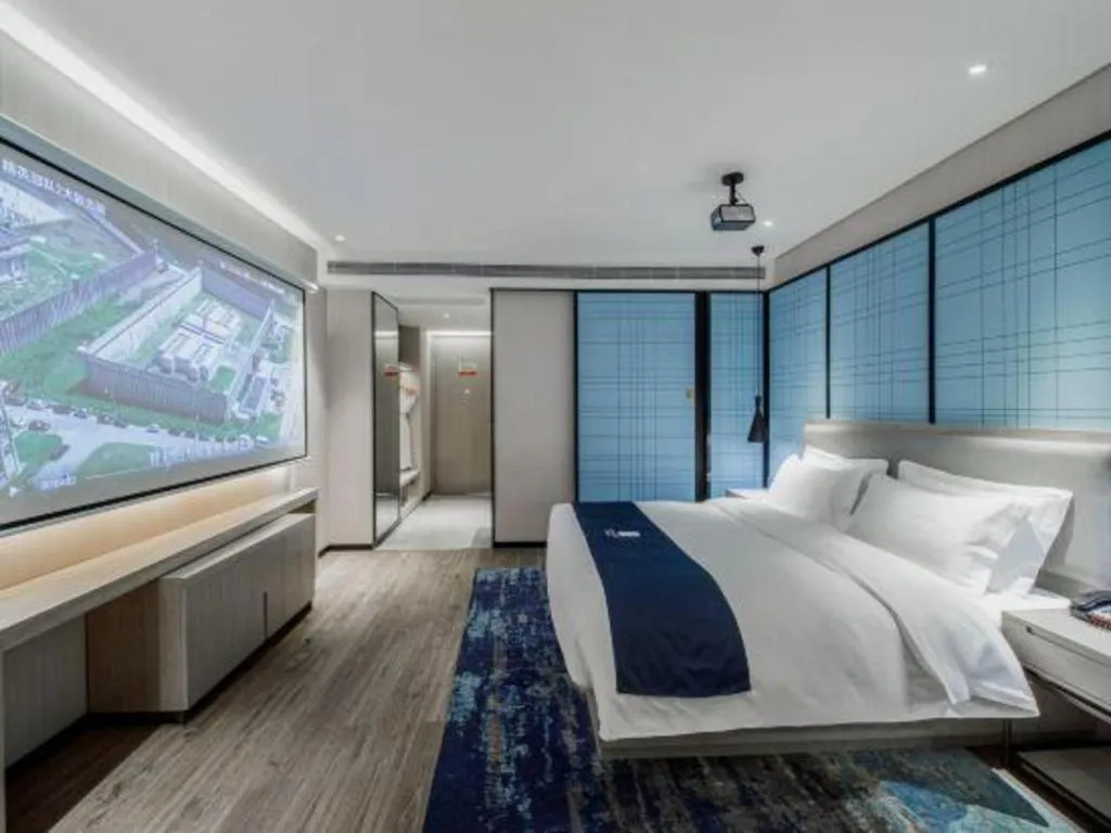 Bed in Echarm Hotel Nanning Dongge Macun Metro Station