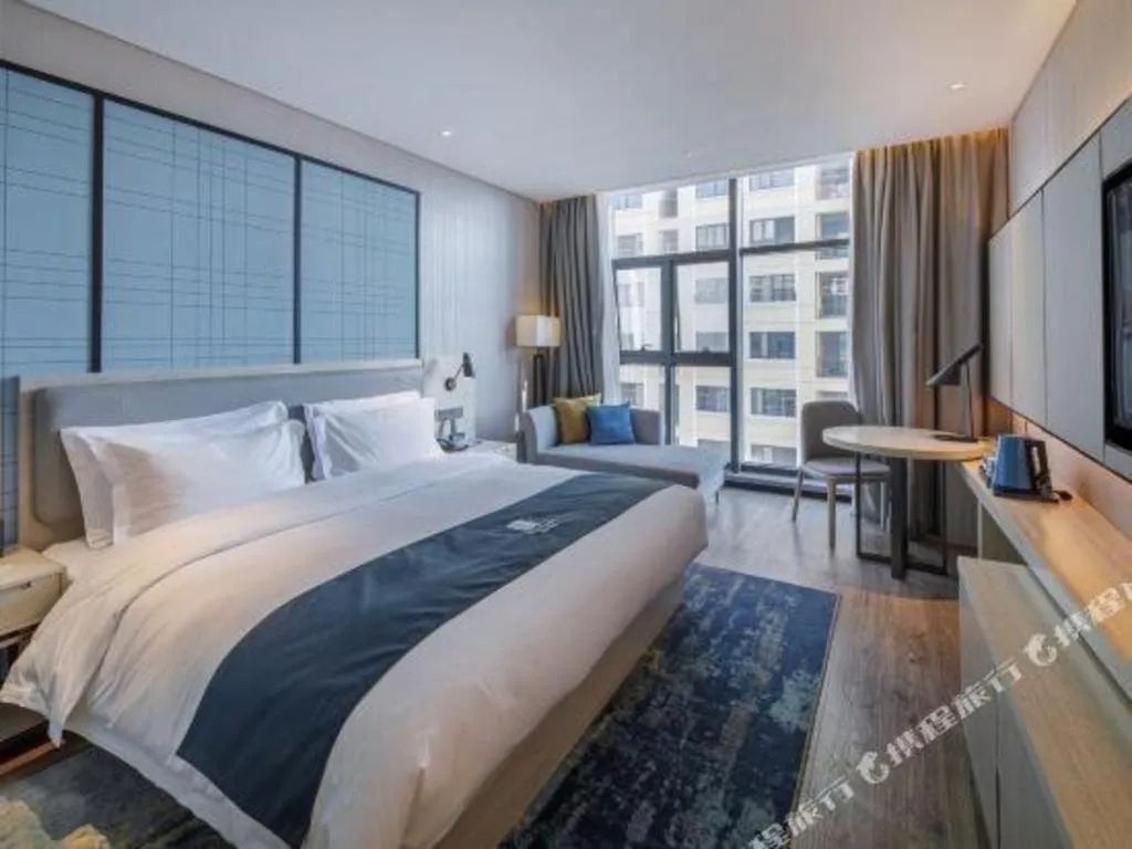 Bed in Echarm Hotel Nanning Dongge Macun Metro Station