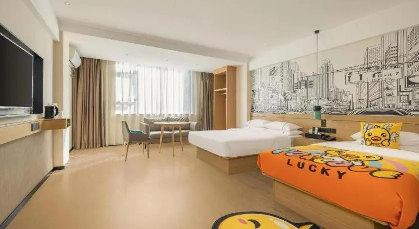 Bed in City Comfort Inn Wuzhou High-speed Railway Station Canghai Lake Park