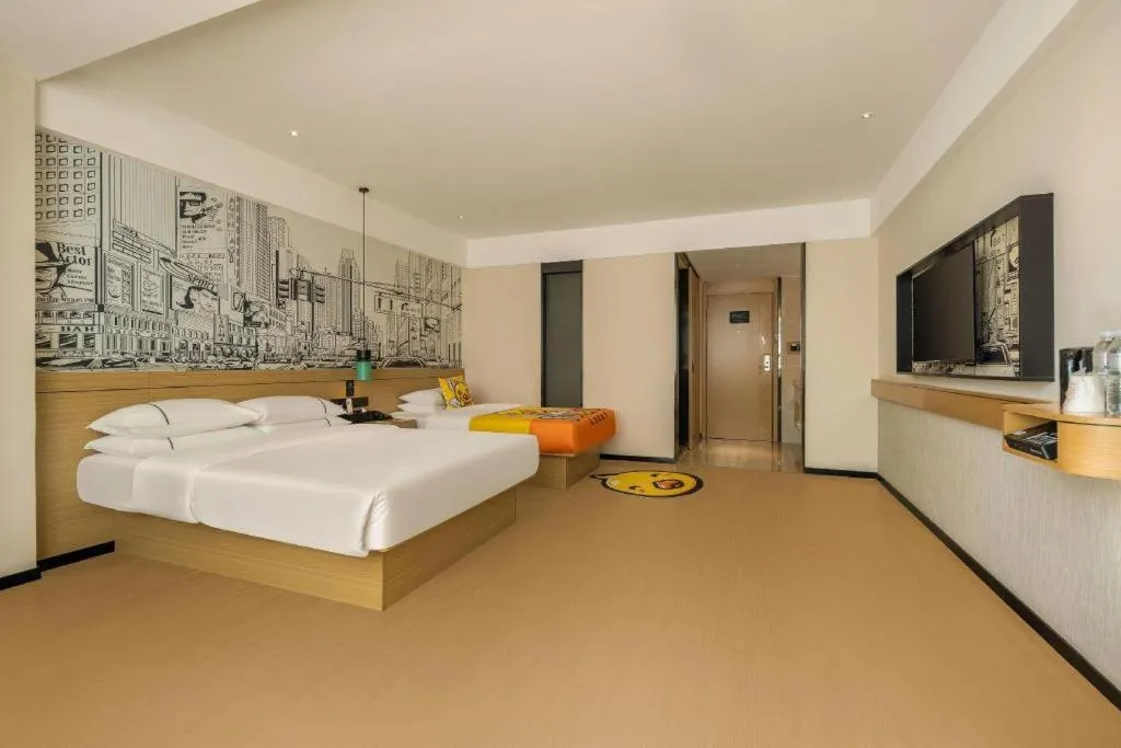 Bed in City Comfort Inn Wuzhou High-speed Railway Station Canghai Lake Park