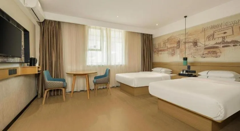 Bed in City Comfort Inn Wuzhou High-speed Railway Station Canghai Lake Park