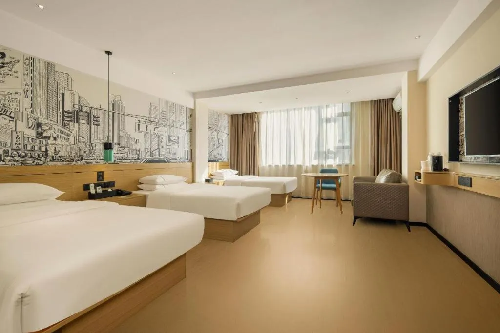 Bed in City Comfort Inn Wuzhou High-speed Railway Station Canghai Lake Park