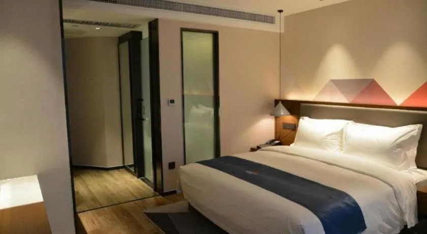 Bed in Borrman Hotel Ji'nan Aoti Center East Provincial Hospital