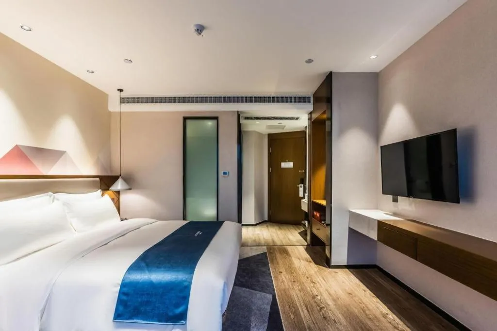 Bed in Borrman Hotel Ji'nan Aoti Center East Provincial Hospital