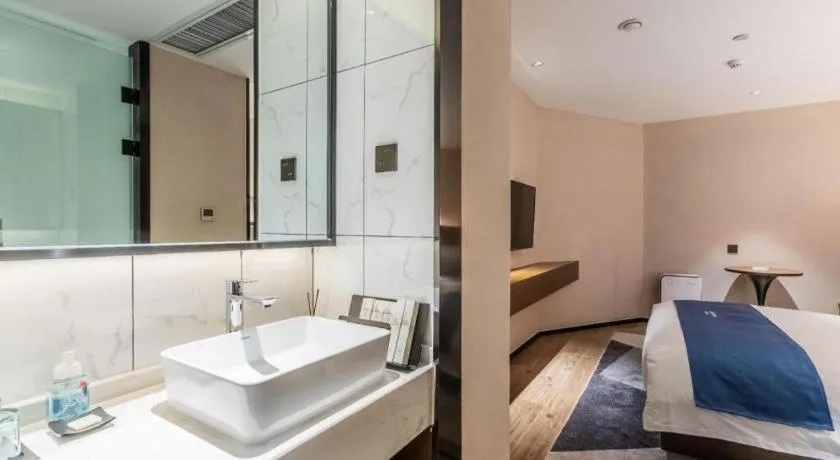 Bed in Borrman Hotel Ji'nan Aoti Center East Provincial Hospital