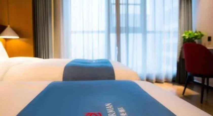 Bed in Borrman Hotel Ji'nan Aoti Center East Provincial Hospital