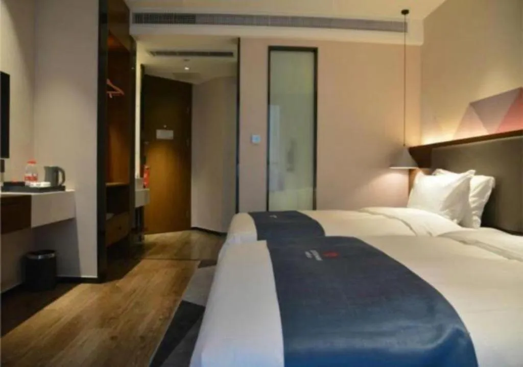 Bed in Borrman Hotel Ji'nan Aoti Center East Provincial Hospital