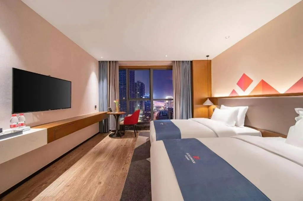 Bed in Borrman Hotel Ji'nan Aoti Center East Provincial Hospital