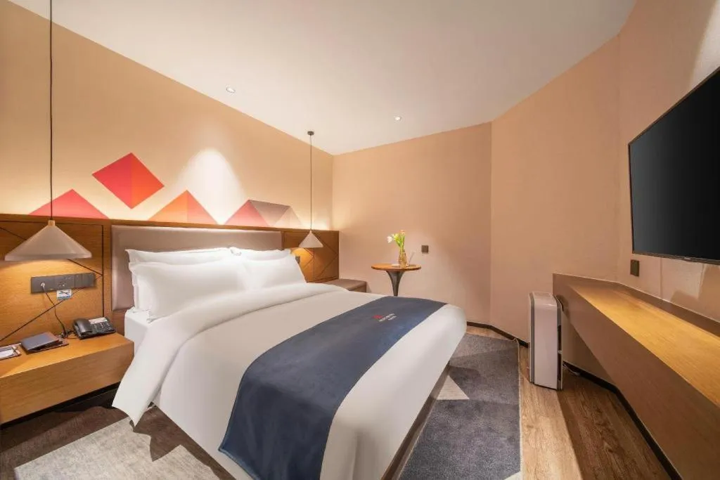 Bed in Borrman Hotel Ji'nan Aoti Center East Provincial Hospital