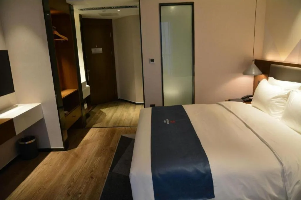 Bed in Borrman Hotel Ji'nan Aoti Center East Provincial Hospital