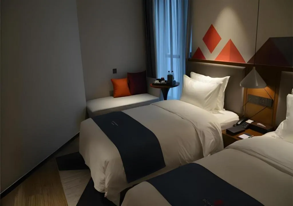 Bed in Borrman Hotel Ji'nan Aoti Center East Provincial Hospital