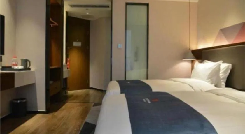 Bed in Borrman Hotel Ji'nan Aoti Center East Provincial Hospital