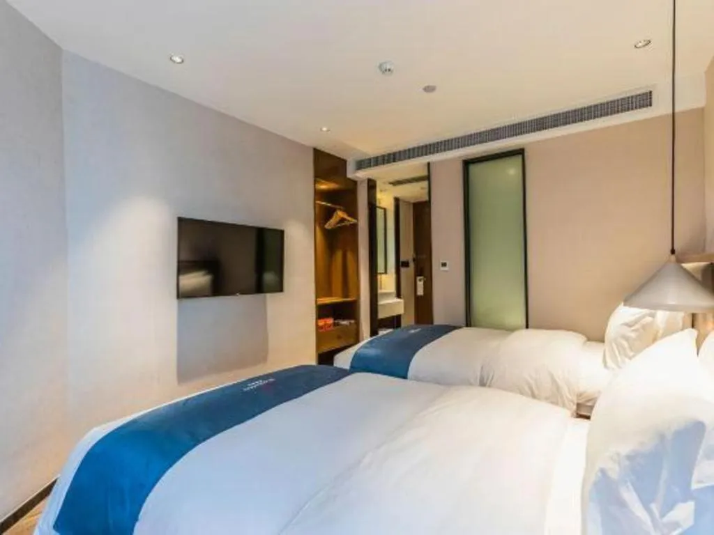 Bed in Borrman Hotel Ji'nan Aoti Center East Provincial Hospital