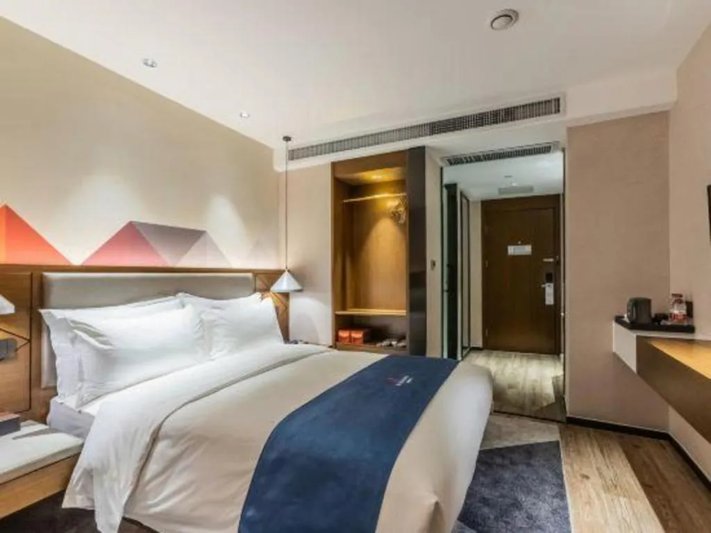 Bed in Borrman Hotel Ji'nan Aoti Center East Provincial Hospital