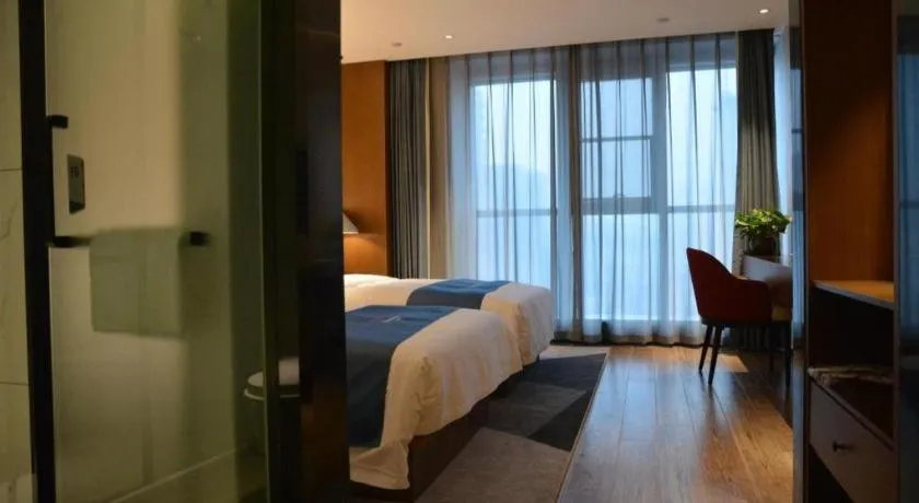 Bed in Borrman Hotel Ji'nan Aoti Center East Provincial Hospital