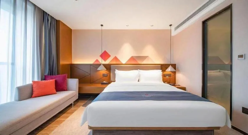 Bed in Borrman Hotel Ji'nan Aoti Center East Provincial Hospital