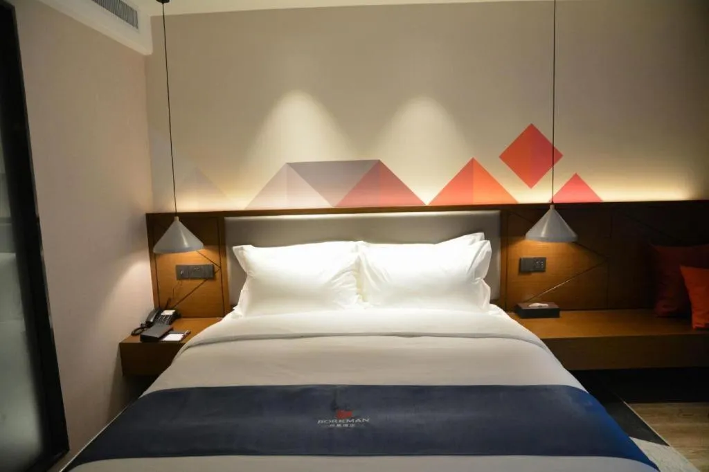 Bed in Borrman Hotel Ji'nan Aoti Center East Provincial Hospital