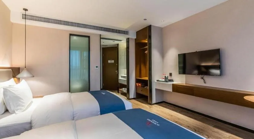 Bed in Borrman Hotel Ji'nan Aoti Center East Provincial Hospital