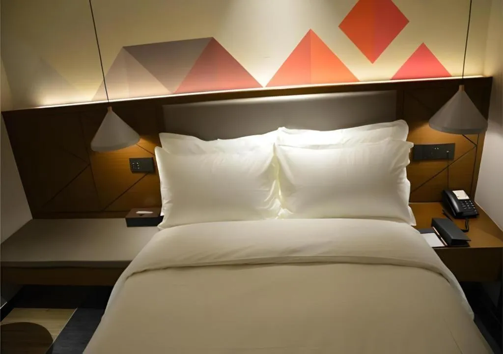 Bed in Borrman Hotel Ji'nan Aoti Center East Provincial Hospital