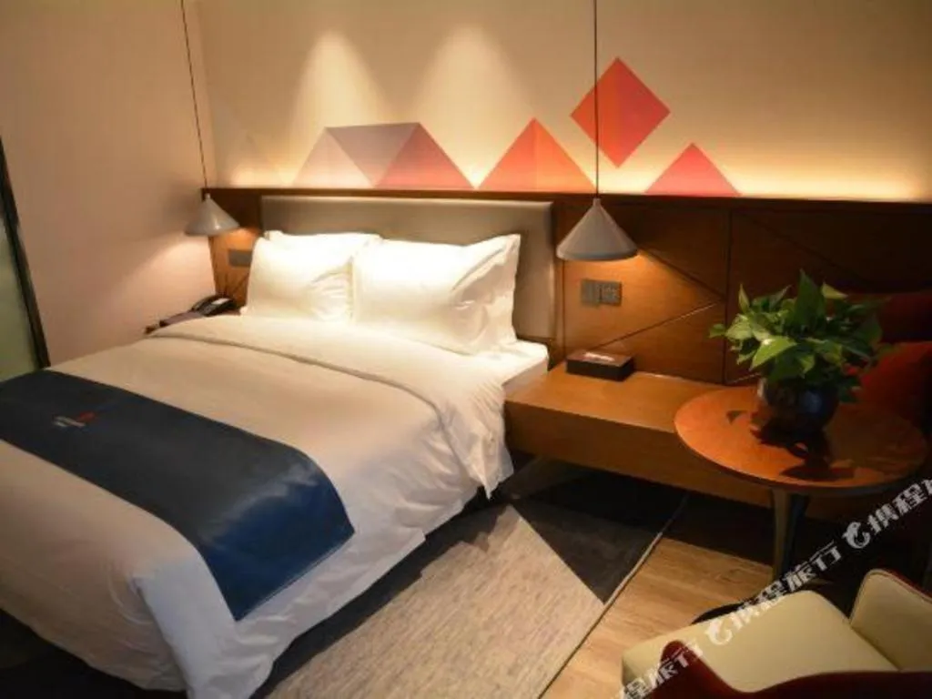 Bed in Borrman Hotel Ji'nan Aoti Center East Provincial Hospital