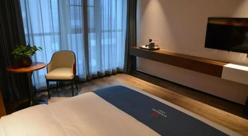 Bed in Borrman Hotel Ji'nan Aoti Center East Provincial Hospital