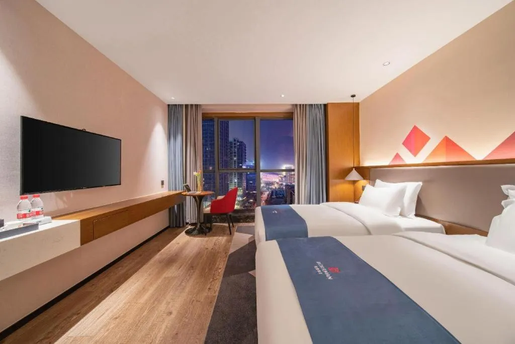 Bed in Borrman Hotel Ji'nan Aoti Center East Provincial Hospital