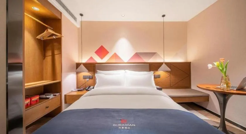 Bed in Borrman Hotel Ji'nan Aoti Center East Provincial Hospital