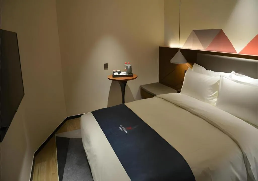 Bed in Borrman Hotel Ji'nan Aoti Center East Provincial Hospital