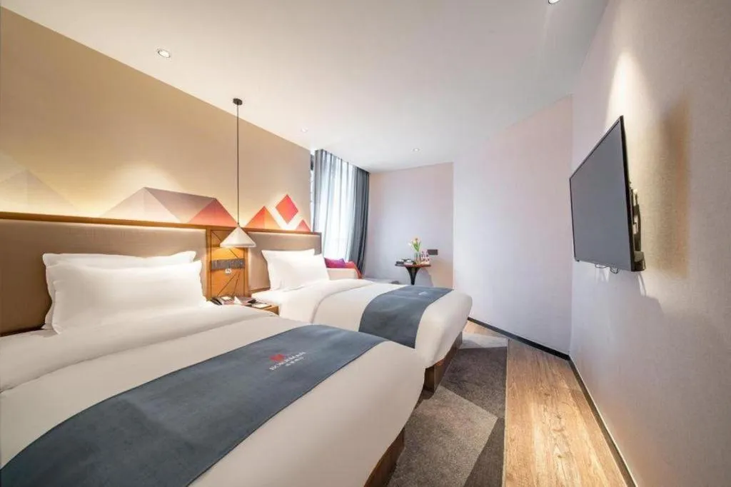 Bed in Borrman Hotel Ji'nan Aoti Center East Provincial Hospital