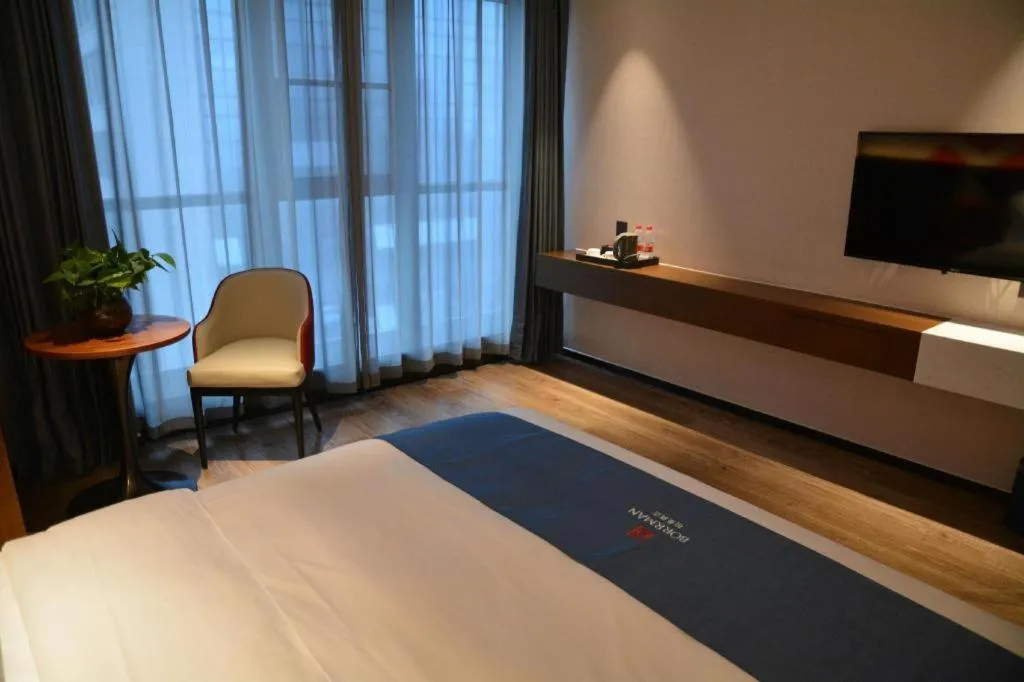 Bed in Borrman Hotel Ji'nan Aoti Center East Provincial Hospital