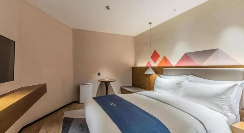 Bed in Borrman Hotel Ji'nan Aoti Center East Provincial Hospital