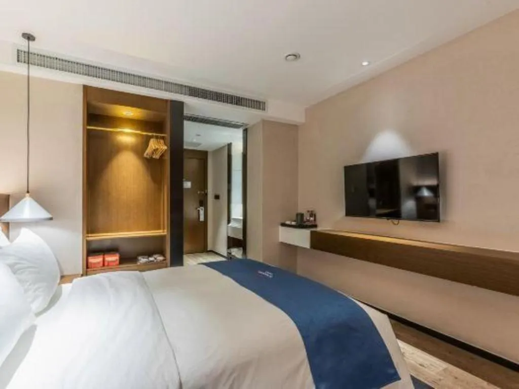 Bed in Borrman Hotel Ji'nan Aoti Center East Provincial Hospital