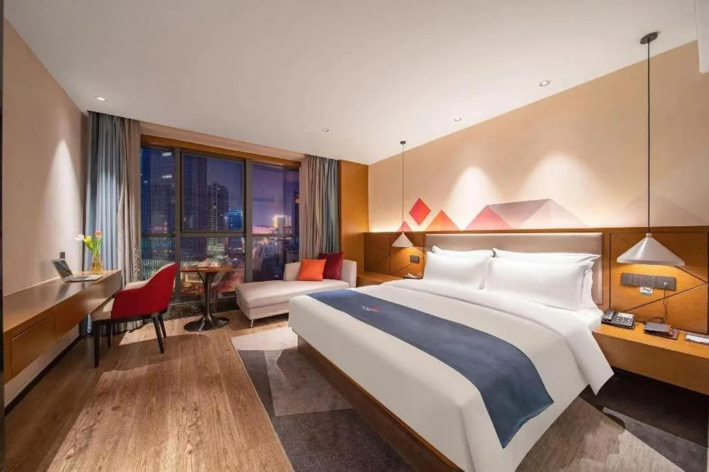 Bed in Borrman Hotel Ji'nan Aoti Center East Provincial Hospital