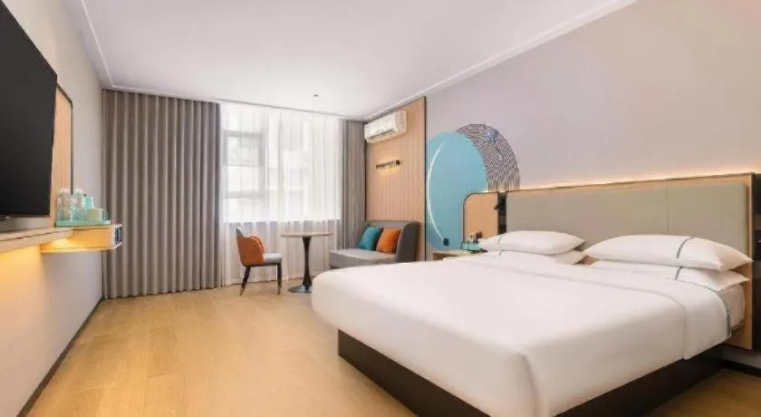 Bed in City Comfort Inn Liuzhou Luzhai Walking Street