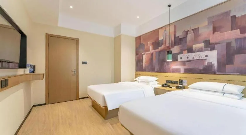 Bed in City Comfort Inn Yangjiang High-tech Zone Pinggang