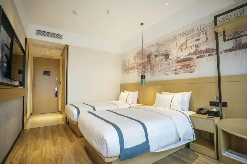 Bed in City Comfort Inn Dali High-speed Railway Station Erhai Park