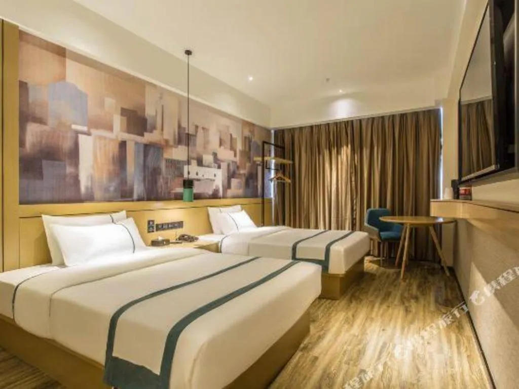 Bed in City Comfort Inn Liuzhou Liucheng