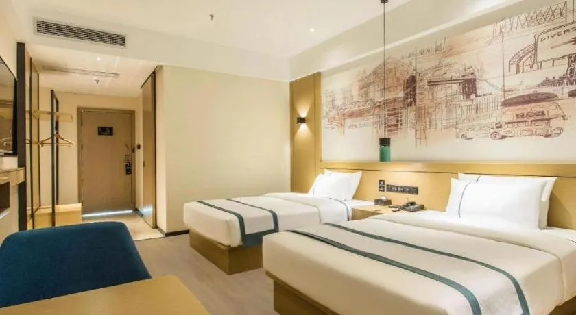Bed in City Comfort Inn Liuzhou Liucheng