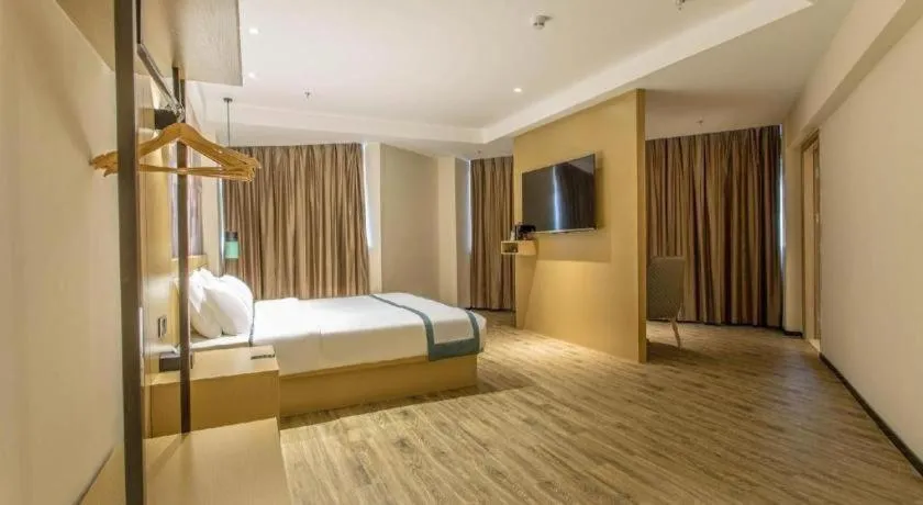 Bed in City Comfort Inn Liuzhou Liucheng