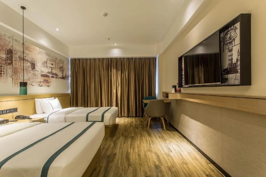 Bed in City Comfort Inn Liuzhou Liucheng