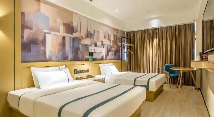 Bed in City Comfort Inn Liuzhou Liucheng