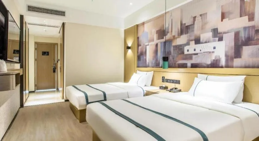 Bed in City Comfort Inn Liuzhou Liucheng